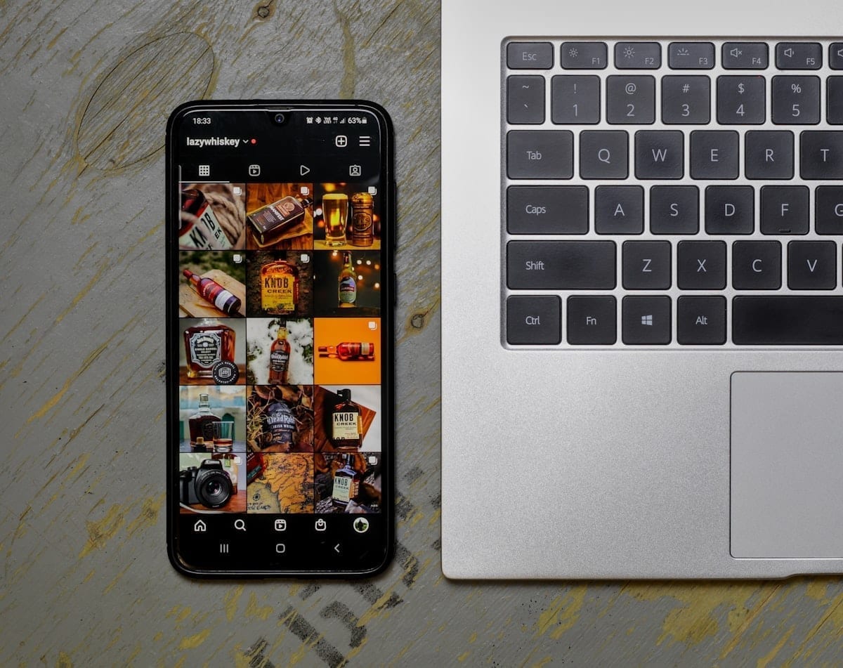Creator cross-posting short-form video from phone to multiple social platforms