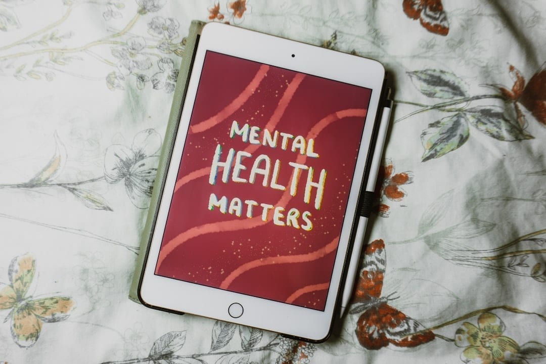 Person reflecting on phone use and mental wellbeing