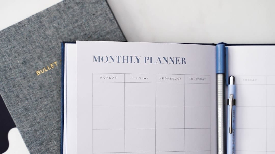 Content calendar on laptop showing scheduled TikTok posts