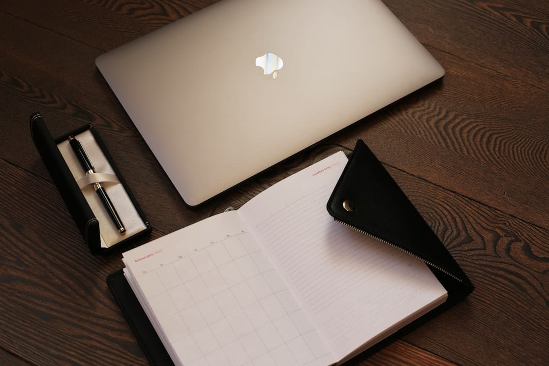 Laptop and phone managing multiple social media accounts