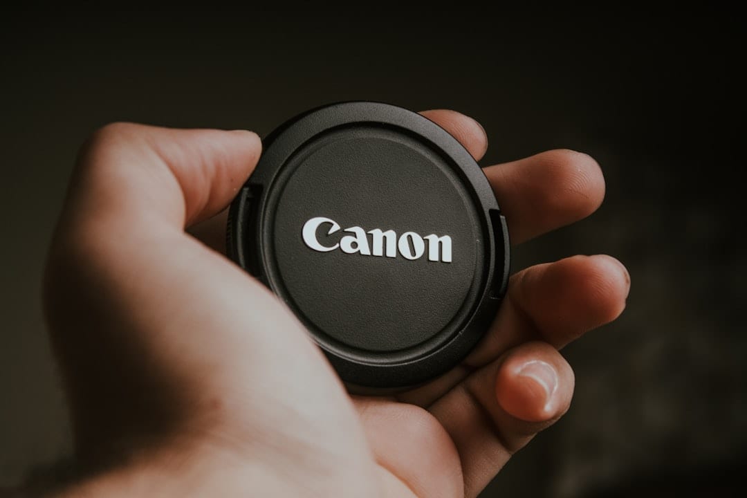 Creator using laptop to draft AI-generated social media captions