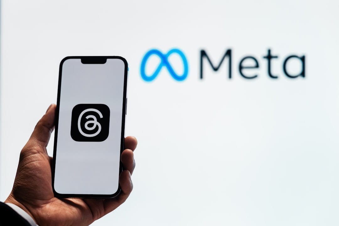 Smartphone displaying a Threads conversation feed for creators
