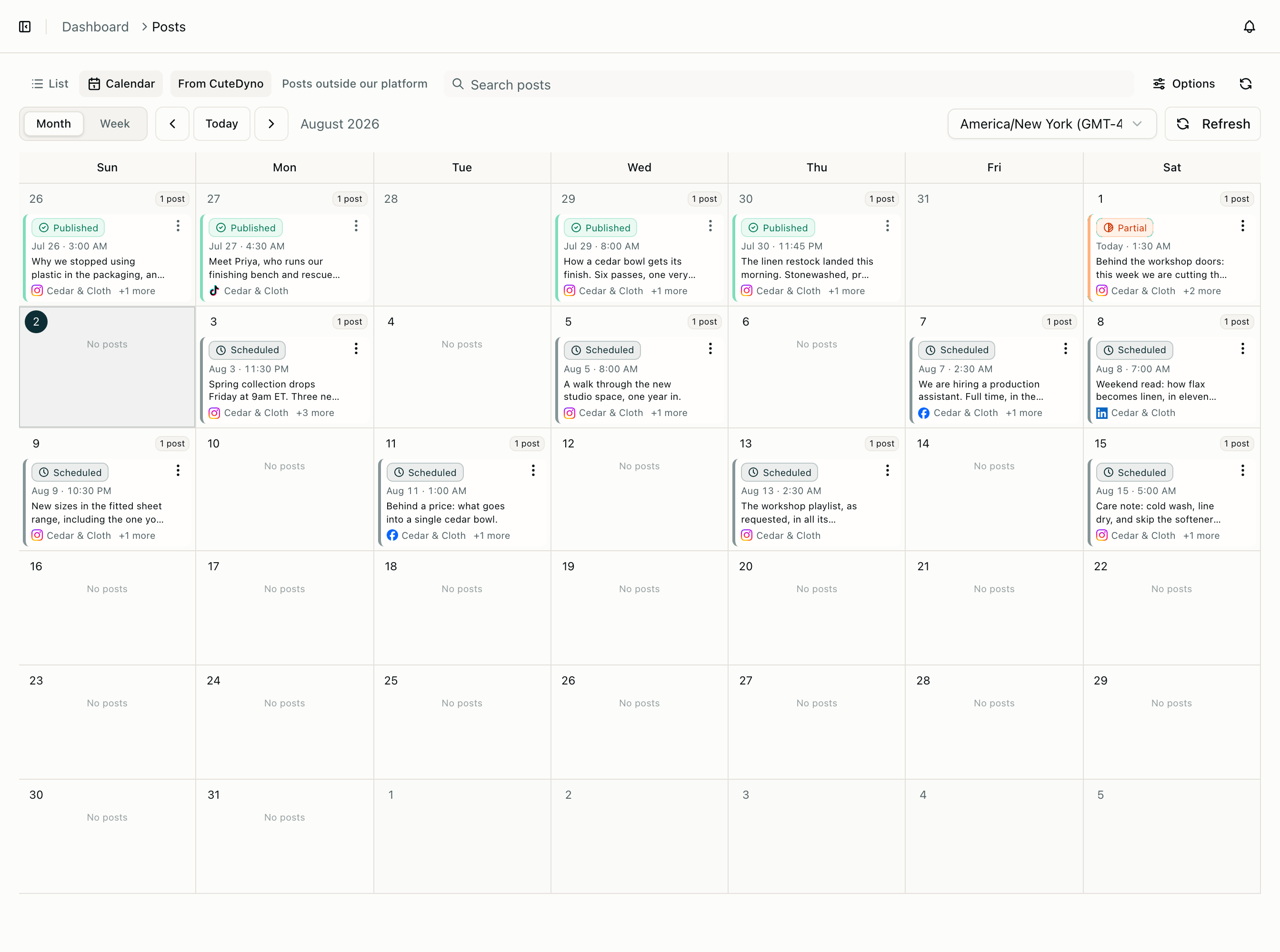 The content calendar in the CuteDyno dashboard, showing published and scheduled posts across connected accounts for the month.